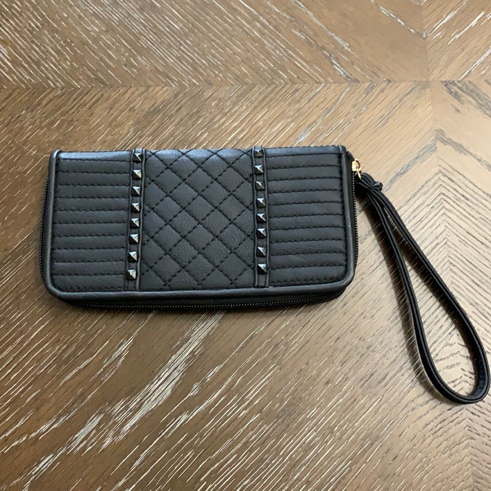 Unbranded black with black brads wristlets